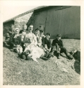  Ellis Kreider and other kids in fron of Herbert's barn. 